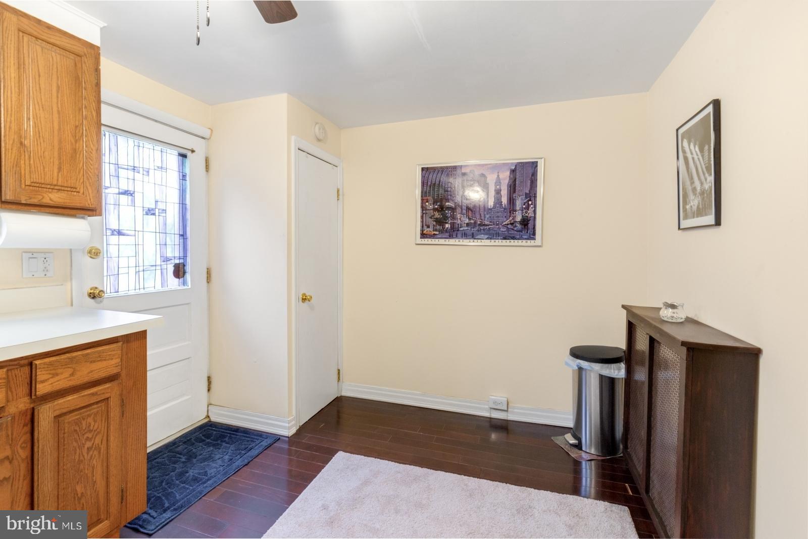 1006 Morris Street Philadelphia, PA 19148 - Photo 11 of 24 a view of a kitchen with wooden floor and electronic appliances