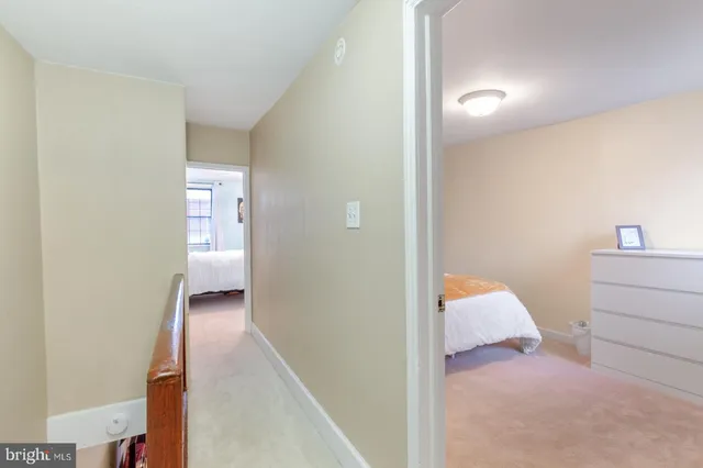 a view of a bedroom from the hallway