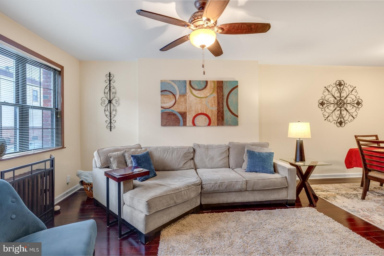 1006 Morris Street Philadelphia, PA 19148 - Photo 2 of 24 a living room with furniture and a window
