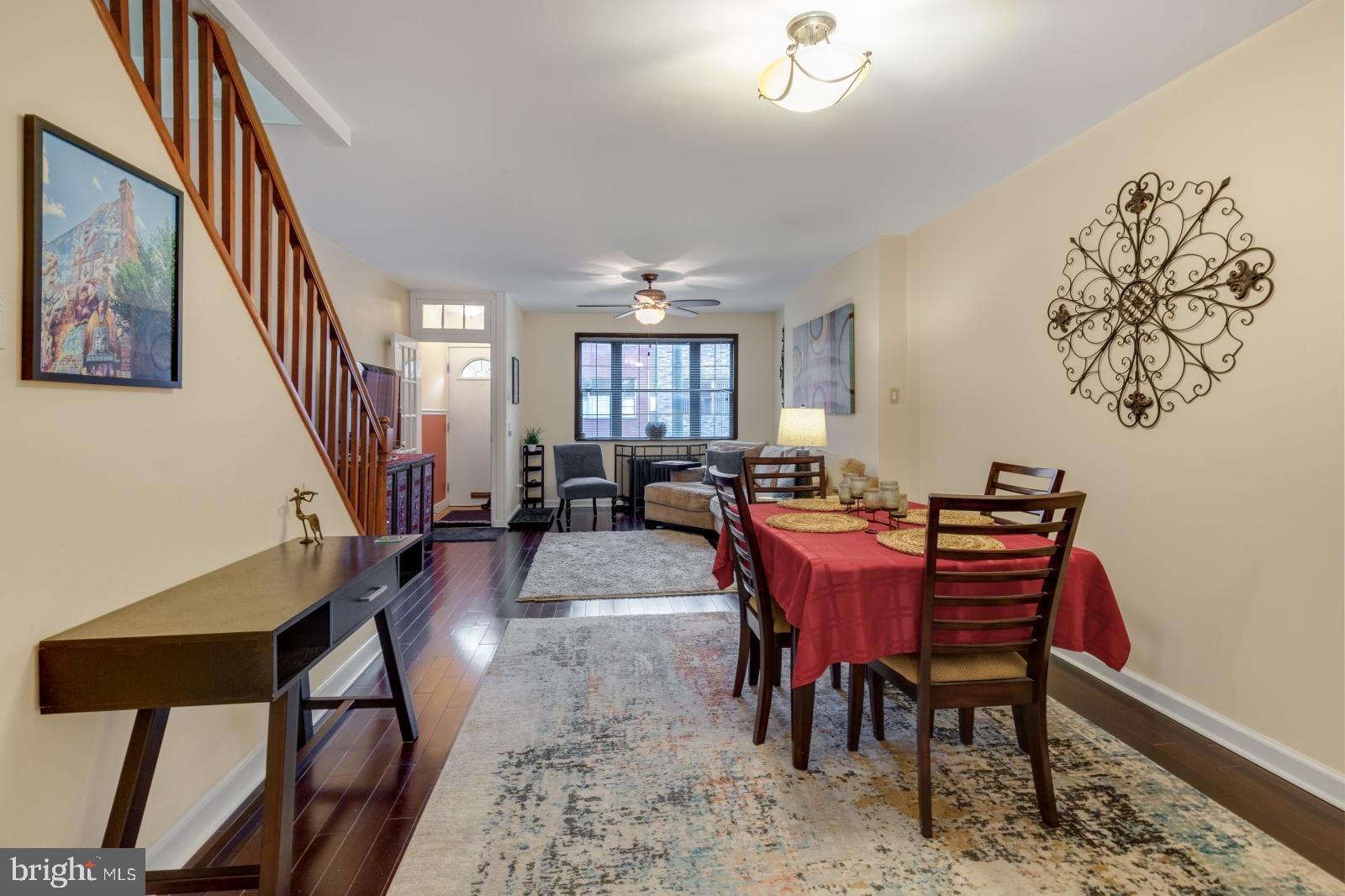 1006 Morris Street Philadelphia, PA 19148 - Photo 8 of 24 a view of a dining room with furniture window and wooden floor