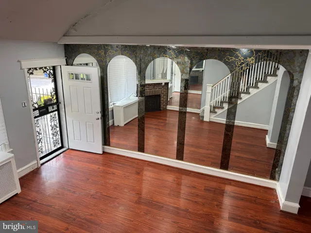 a view of entryway with wooden floor