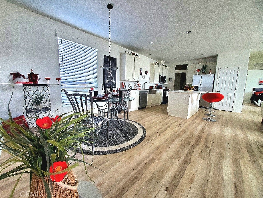 21621 Sandia Road, Unit 150 Apple Valley, CA 92308 - Photo 11 of 45 a very nice looking room with a couch and a table