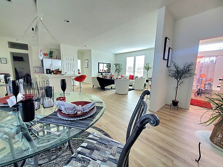 21621 Sandia Road, Unit 150 Apple Valley, CA 92308 - Photo 12 of 45 a living room with furniture and wooden floor