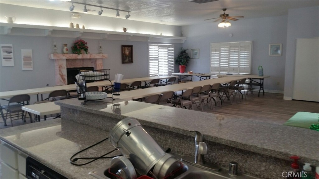 21621 Sandia Road, Unit 150 Apple Valley, CA 92308 - Photo 41 of 45 a living room with furniture and a wooden floor