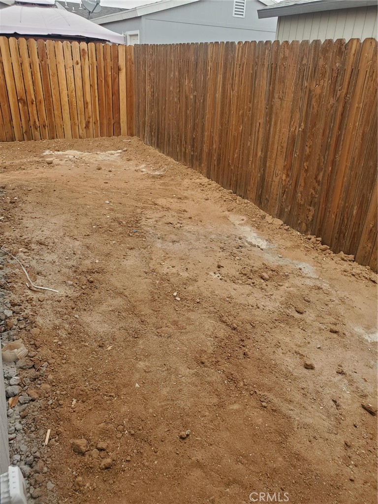 21621 Sandia Road, Unit 150 Apple Valley, CA 92308 - Photo 8 of 45 a view of wooden wall