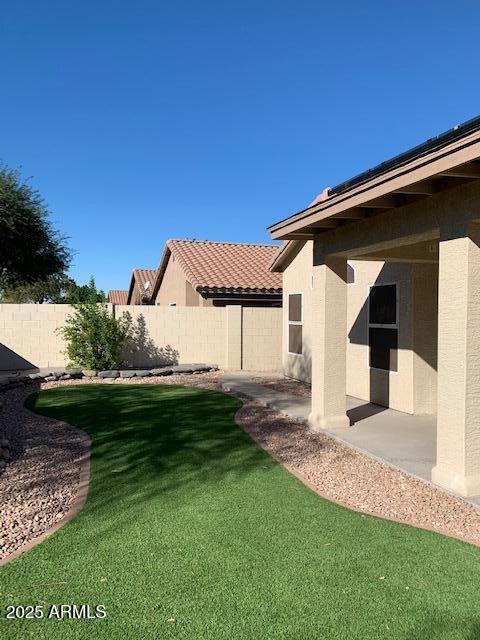 1373 West Kesler Lane Chandler, AZ 85224 - Photo 20 of 25 a front view of a house with garden