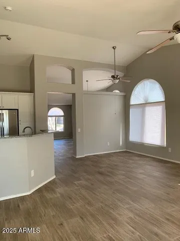 a view of a kitchen with a sink and a dishwasher