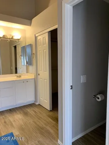 a view of a bathroom with a tub shower and sink