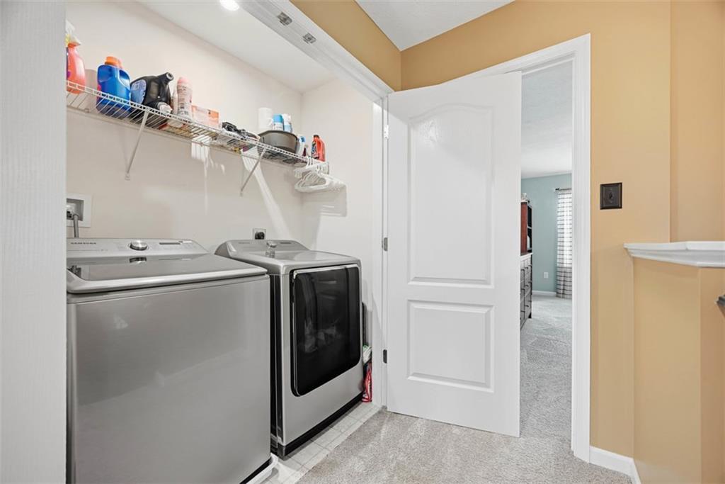 155 Craig Street Imperial, PA 15126 - Photo 22 of 39 a utility room with dryer and washer