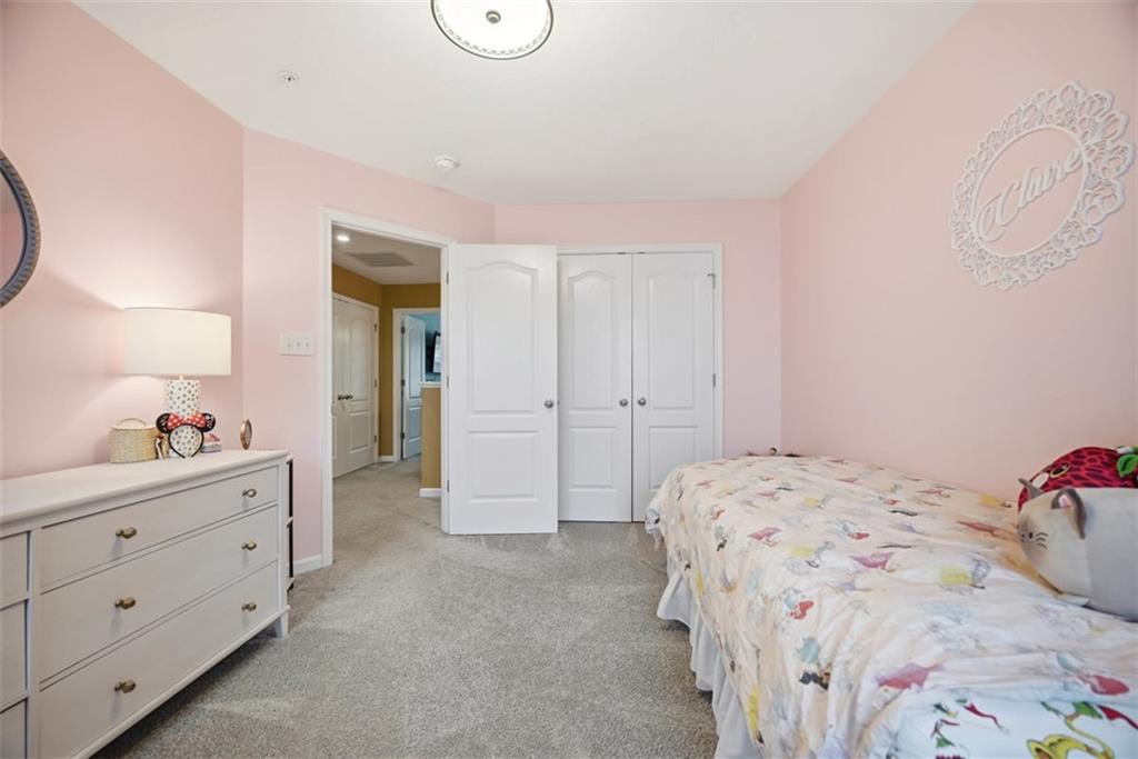 155 Craig Street Imperial, PA 15126 - Photo 29 of 39 a bedroom with a bed and a dresser in it