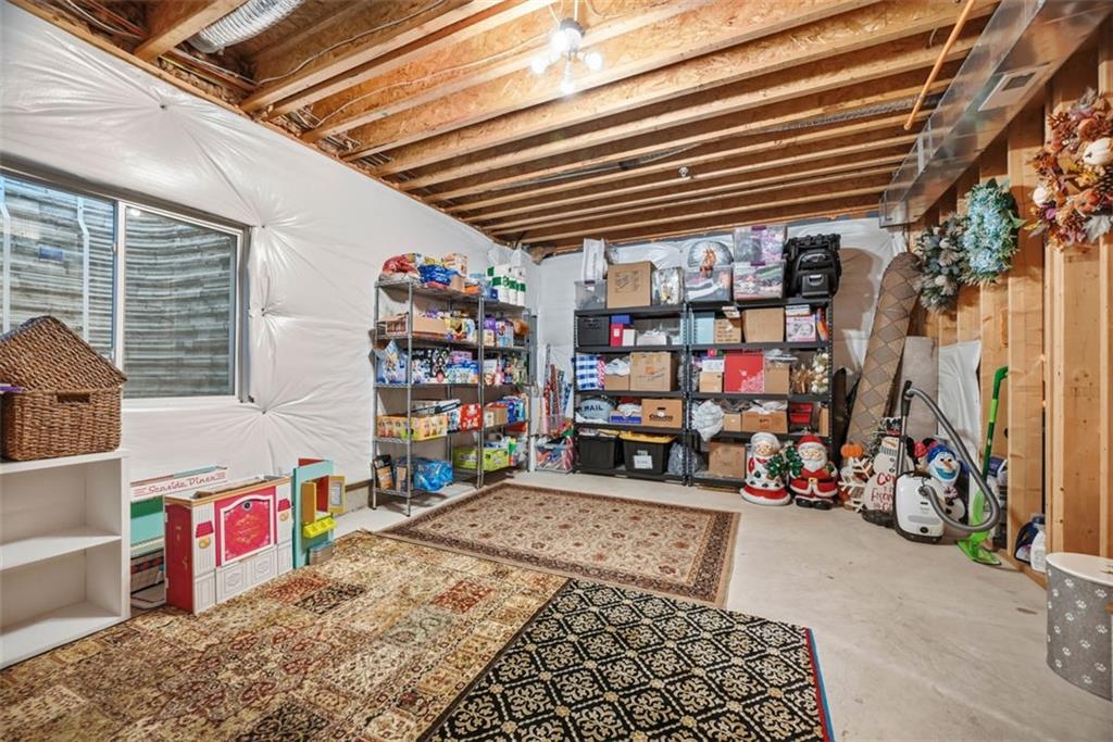 155 Craig Street Imperial, PA 15126 - Photo 32 of 39 a room with storage and a white umbrella