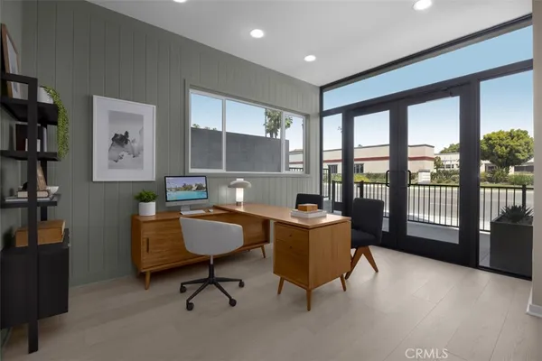 a workspace with furniture and a window