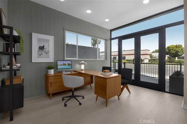 a workspace with furniture and a window