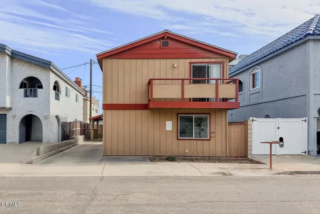 a front view of a house with a garage