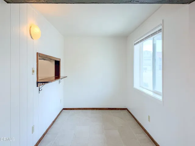 an empty room with window