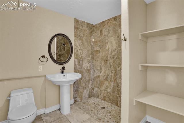 1510 York Road, Unit 102 Colorado Springs, CO 80920 - Photo 8 of 22 3/4 Main Level Bath, oversized shower for easy of access
