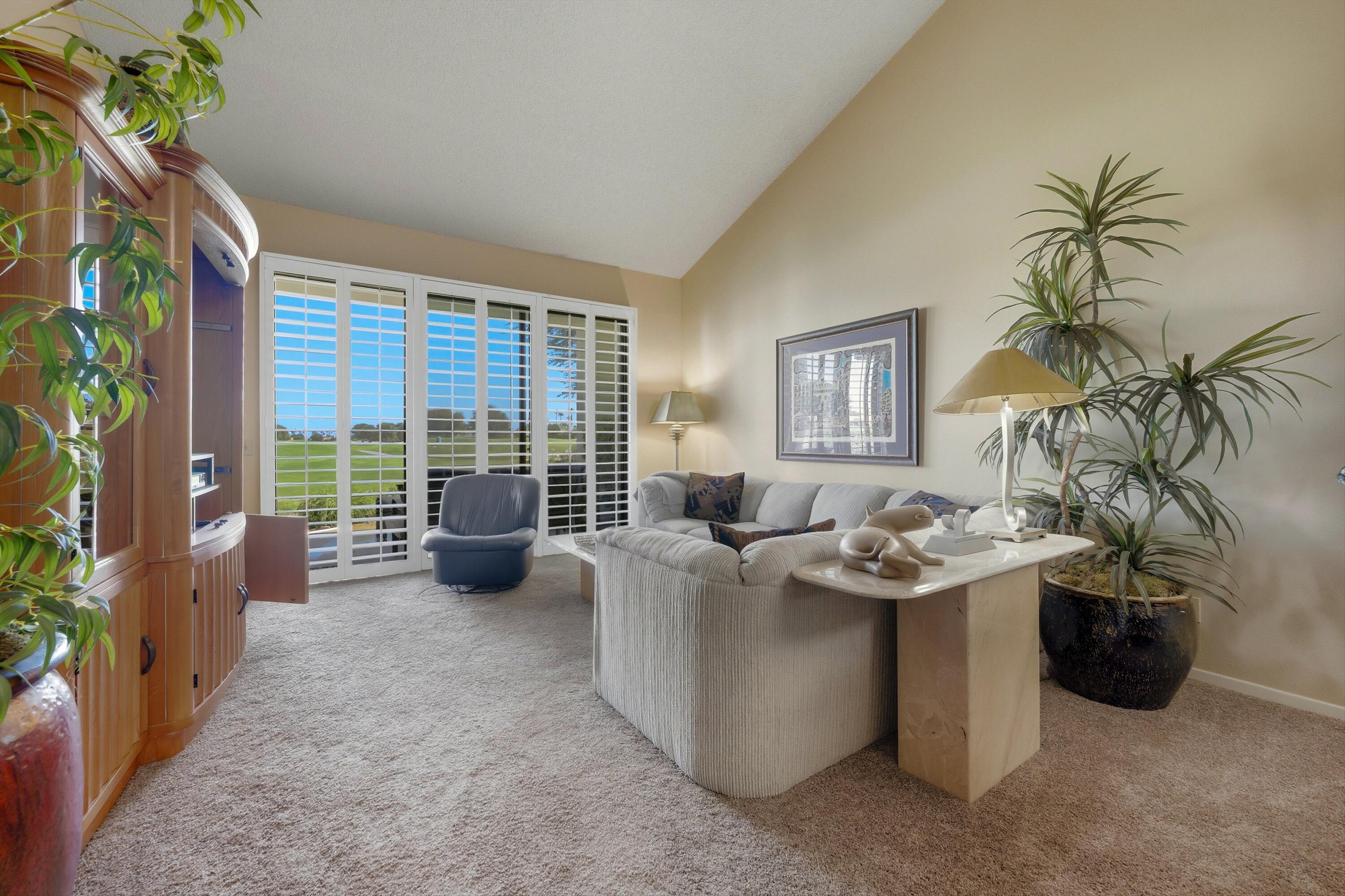 54860 Inverness Way La Quinta, CA 92253 - Photo 22 of 26 a view of a livingroom with furniture and a potted plant
