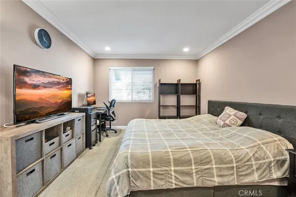 a bathroom with a granite countertop sink a light fixture and a mirror