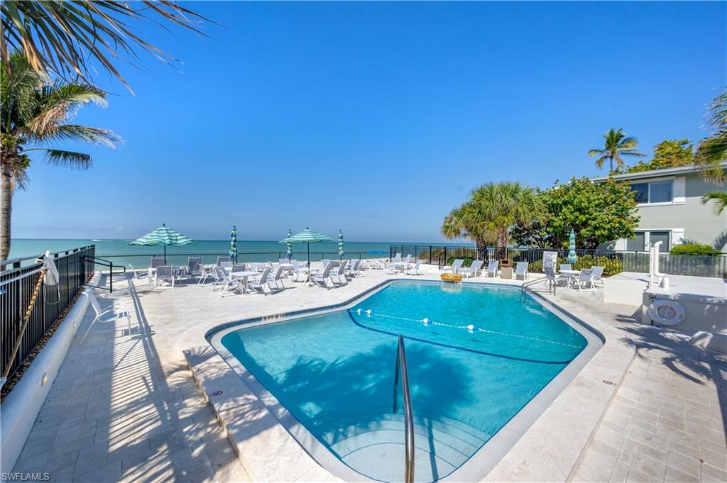 SURFSIDE CLUB POOL AND PATIO OVERLOOKS THE GULF
