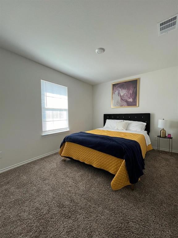 3141 Glazner Drive Forney, TX 75126 - Photo 6 of 14 Bedroom with carpet floors and baseboards