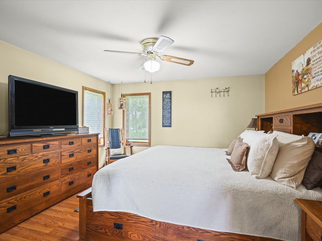 8500 Manchester Road Capron, IL 61012 - Photo 26 of 51 a bedroom with a bed and a flat screen tv