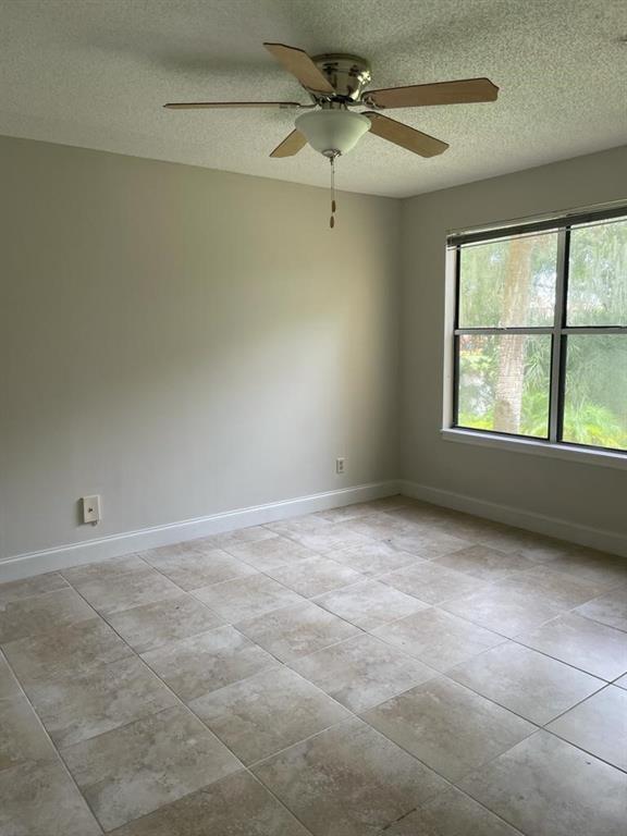 2305 North Congress Avenue Boynton Beach, FL 33426 - Photo 11 of 12 a view of an empty room with a window