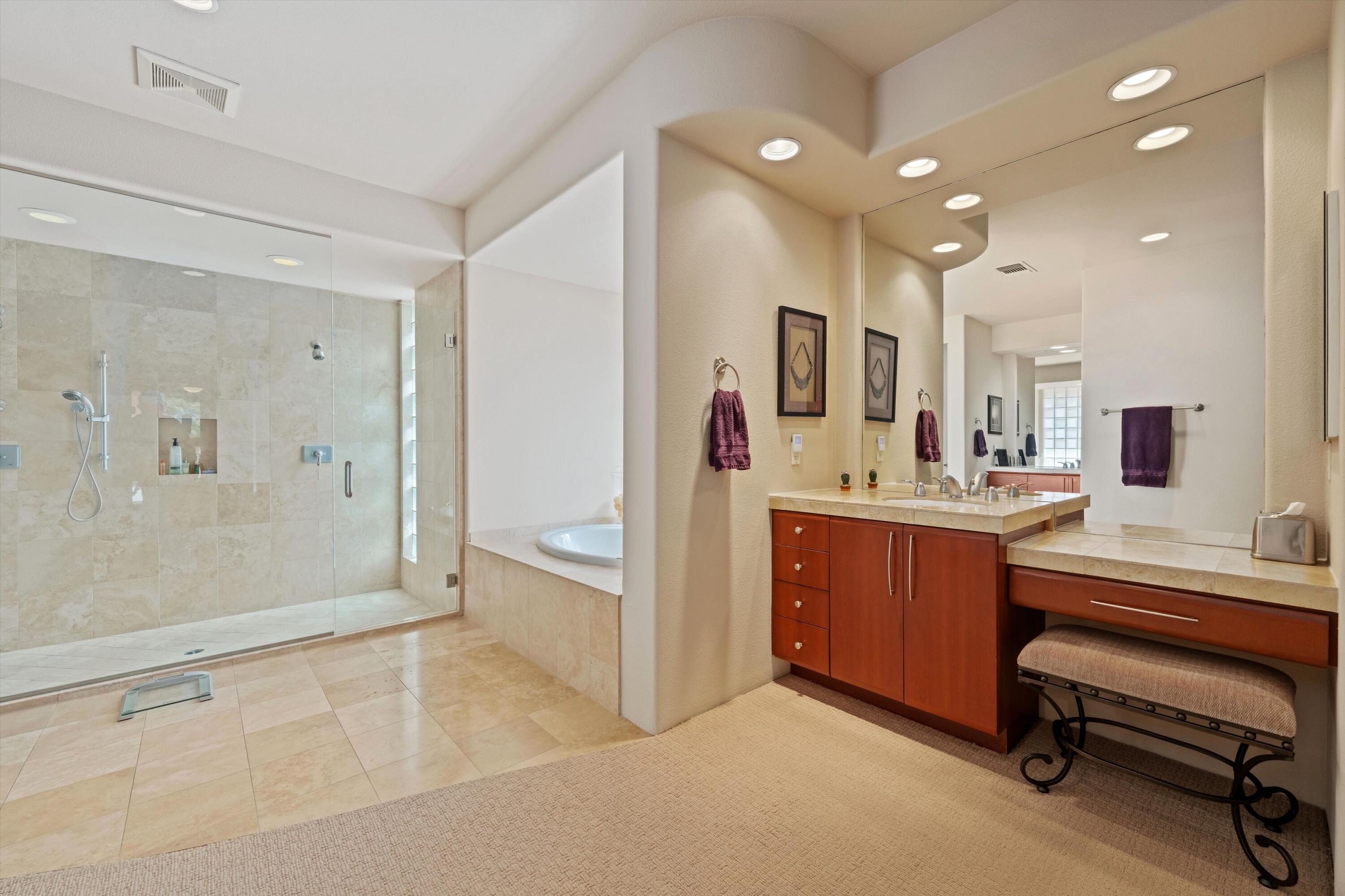 79625 Vía Sin Cuidado La Quinta, CA 92253 - Photo 37 of 52 a bathroom with a sink a toilet and shower