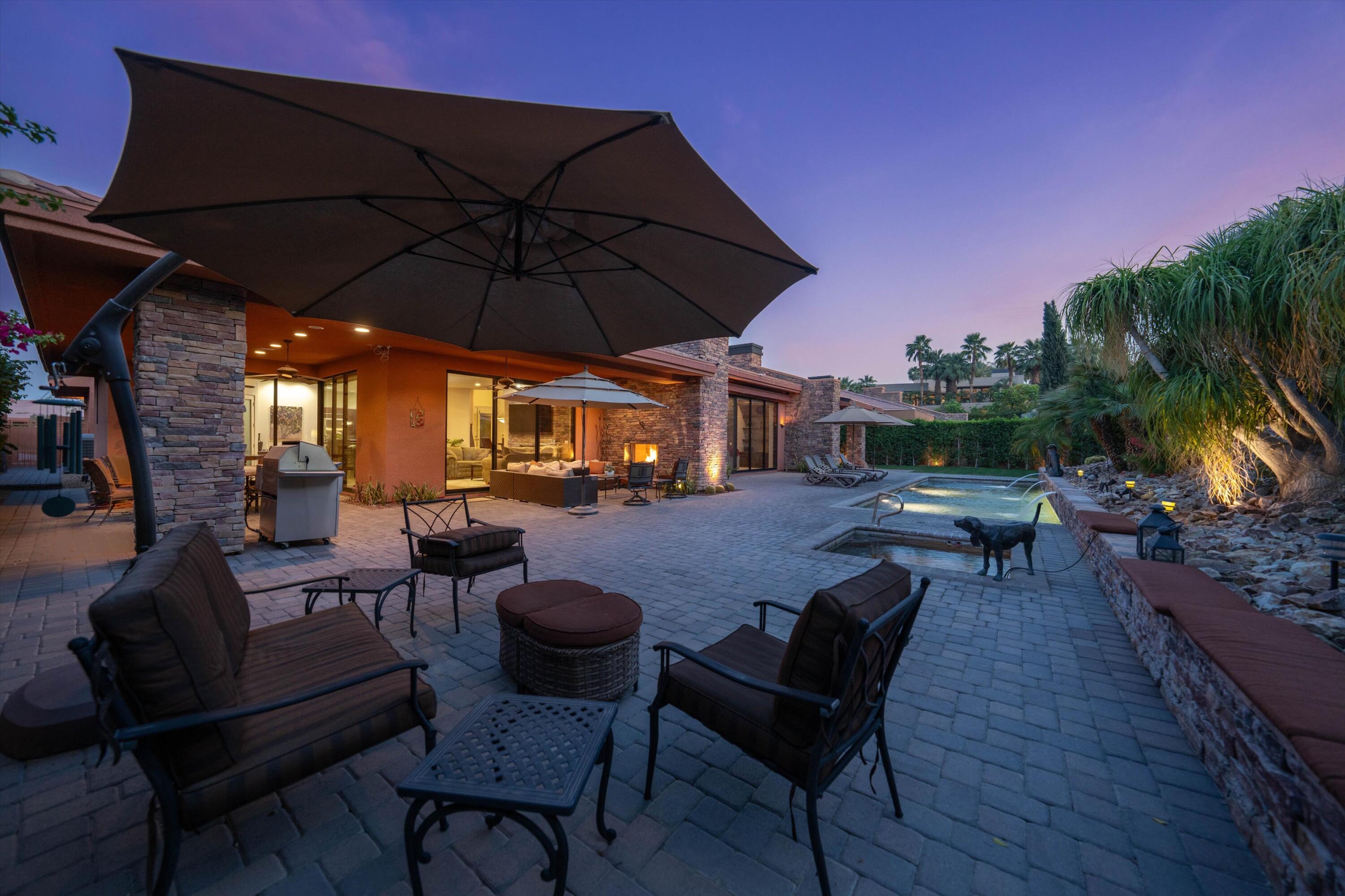 79625 Vía Sin Cuidado La Quinta, CA 92253 - Photo 5 of 52 a view of a backyard with sitting area
