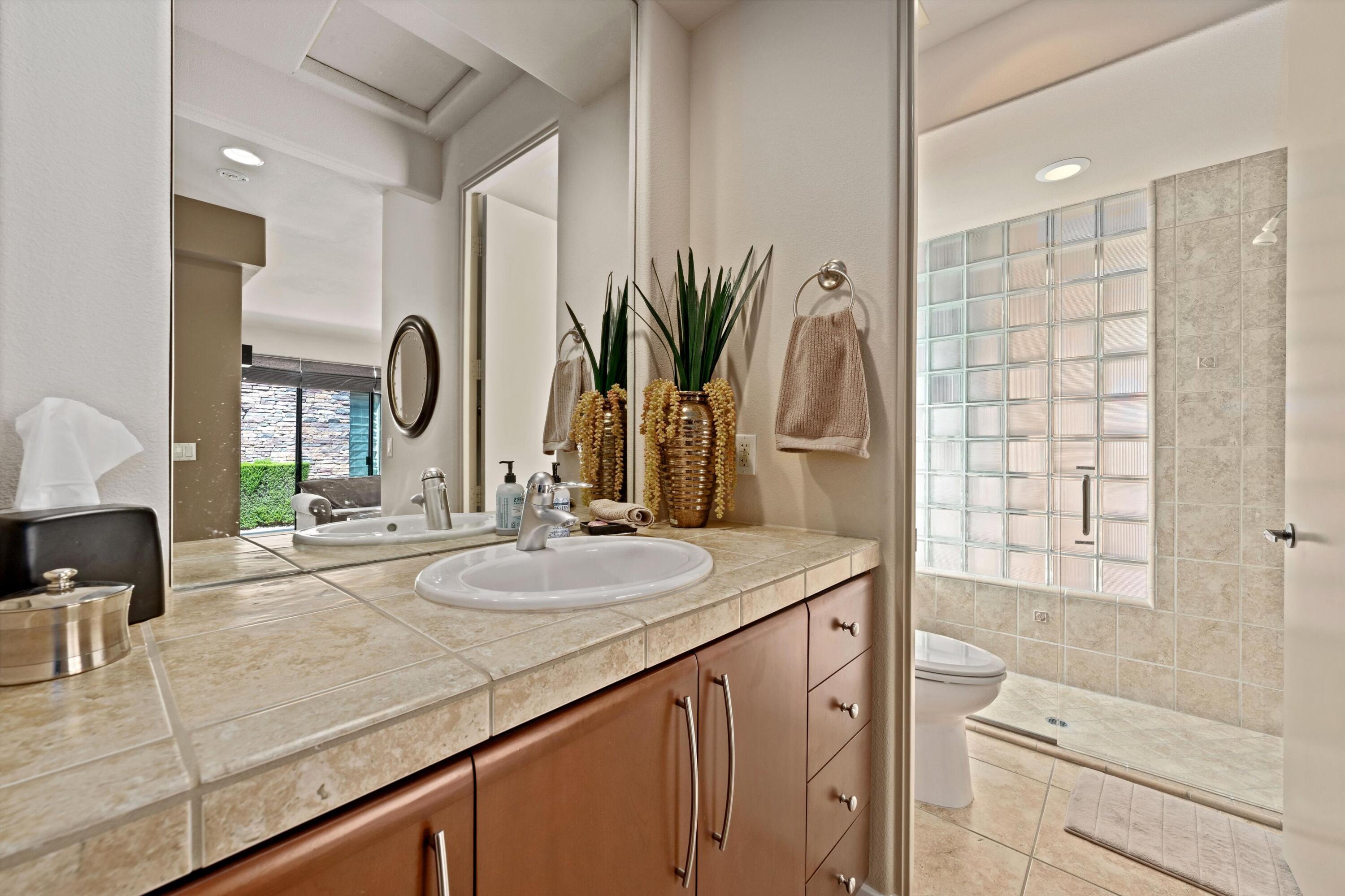 79625 Vía Sin Cuidado La Quinta, CA 92253 - Photo 51 of 52 a kitchen with stainless steel appliances granite countertop a sink and a refrigerator