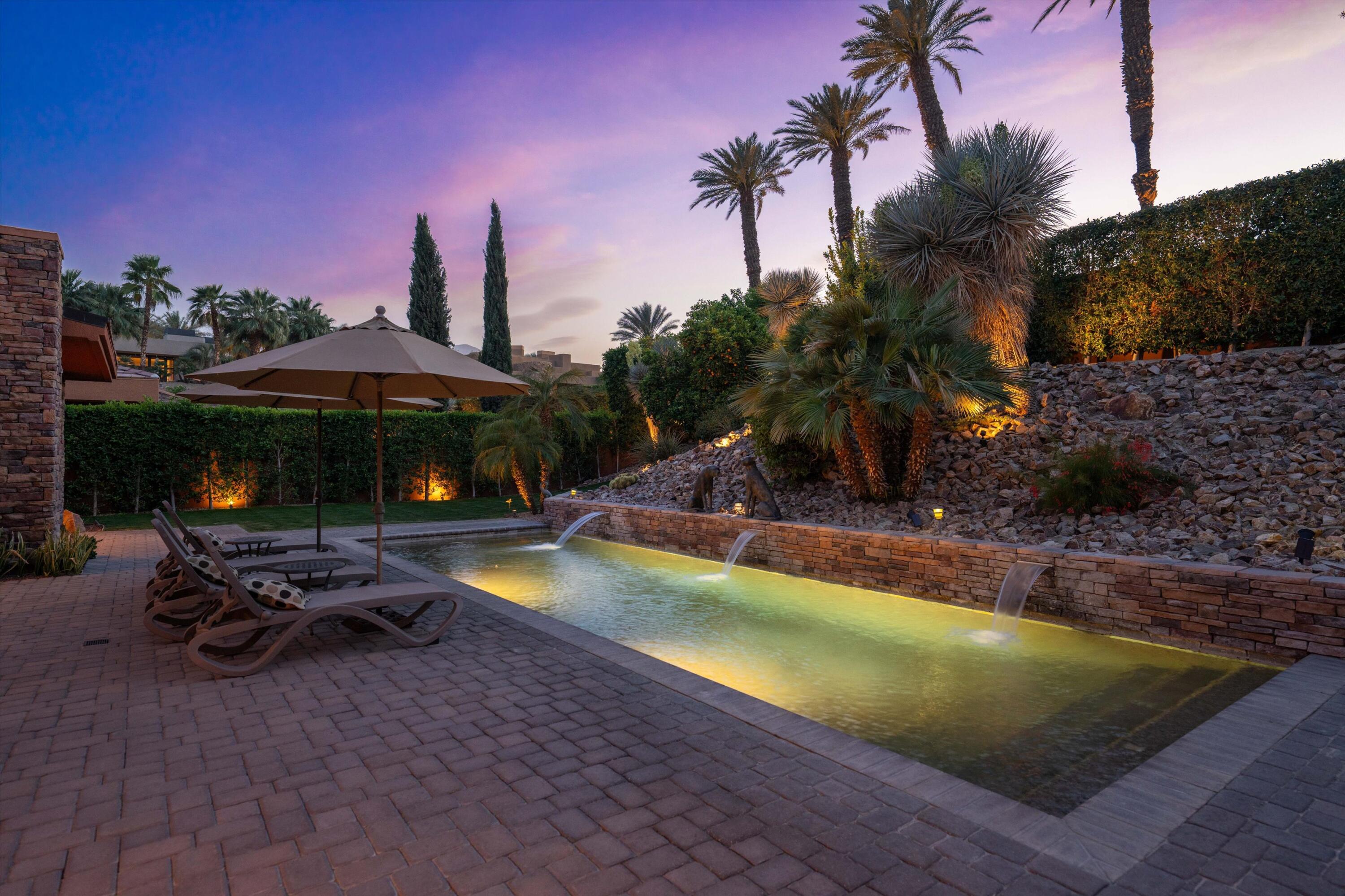 79625 Vía Sin Cuidado La Quinta, CA 92253 - Photo 6 of 52 a swimming pool with outdoor seating and yard