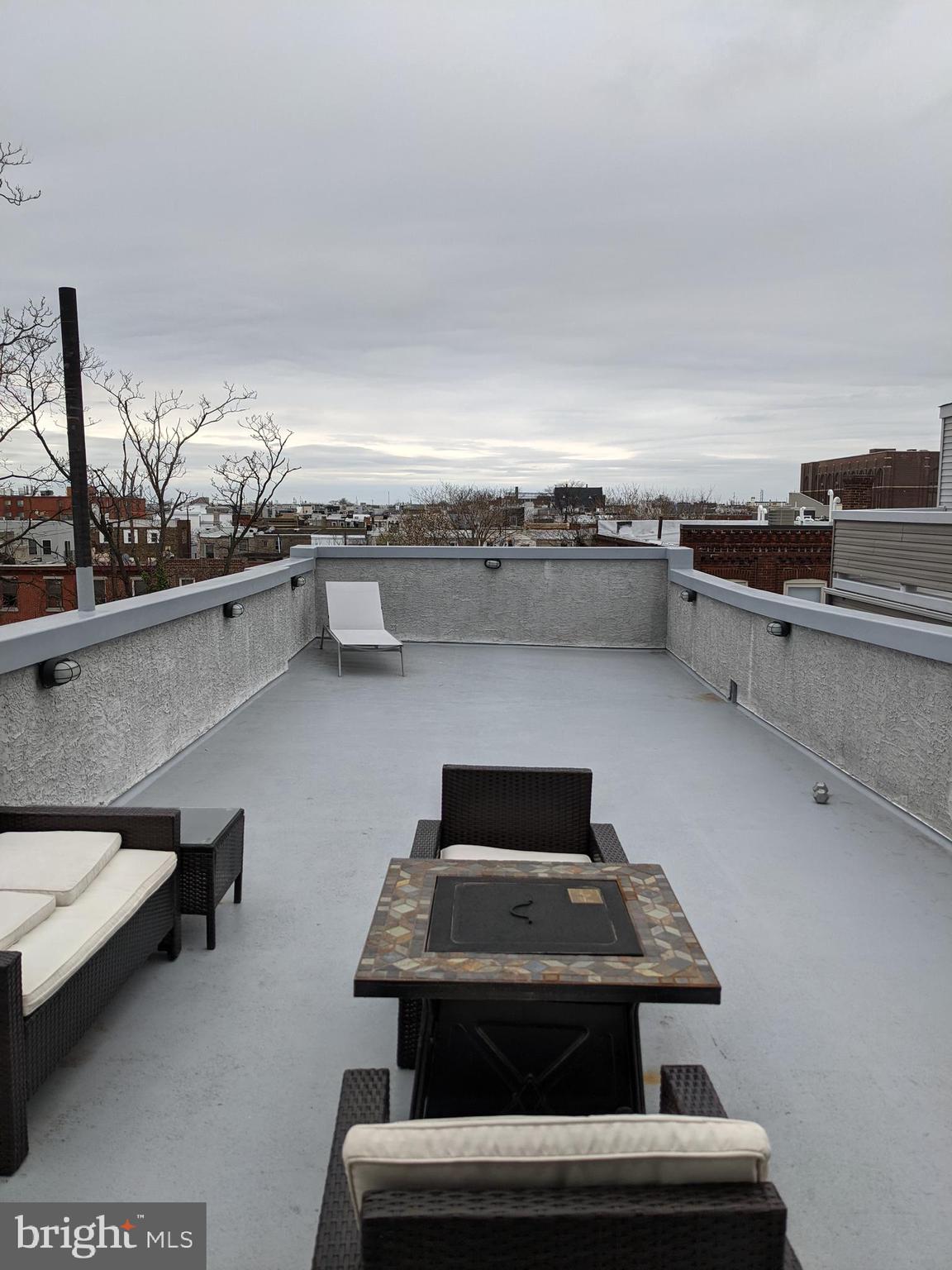 1318 South Broad Street, Unit 2R Philadelphia, PA 19146 - Photo 10 of 11 a living room with furniture