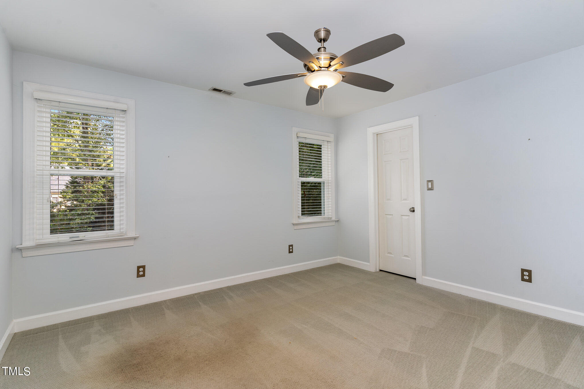 3008 Dunkirk Drive Raleigh, NC 27613 - Photo 18 of 33 a view of an empty room with a window