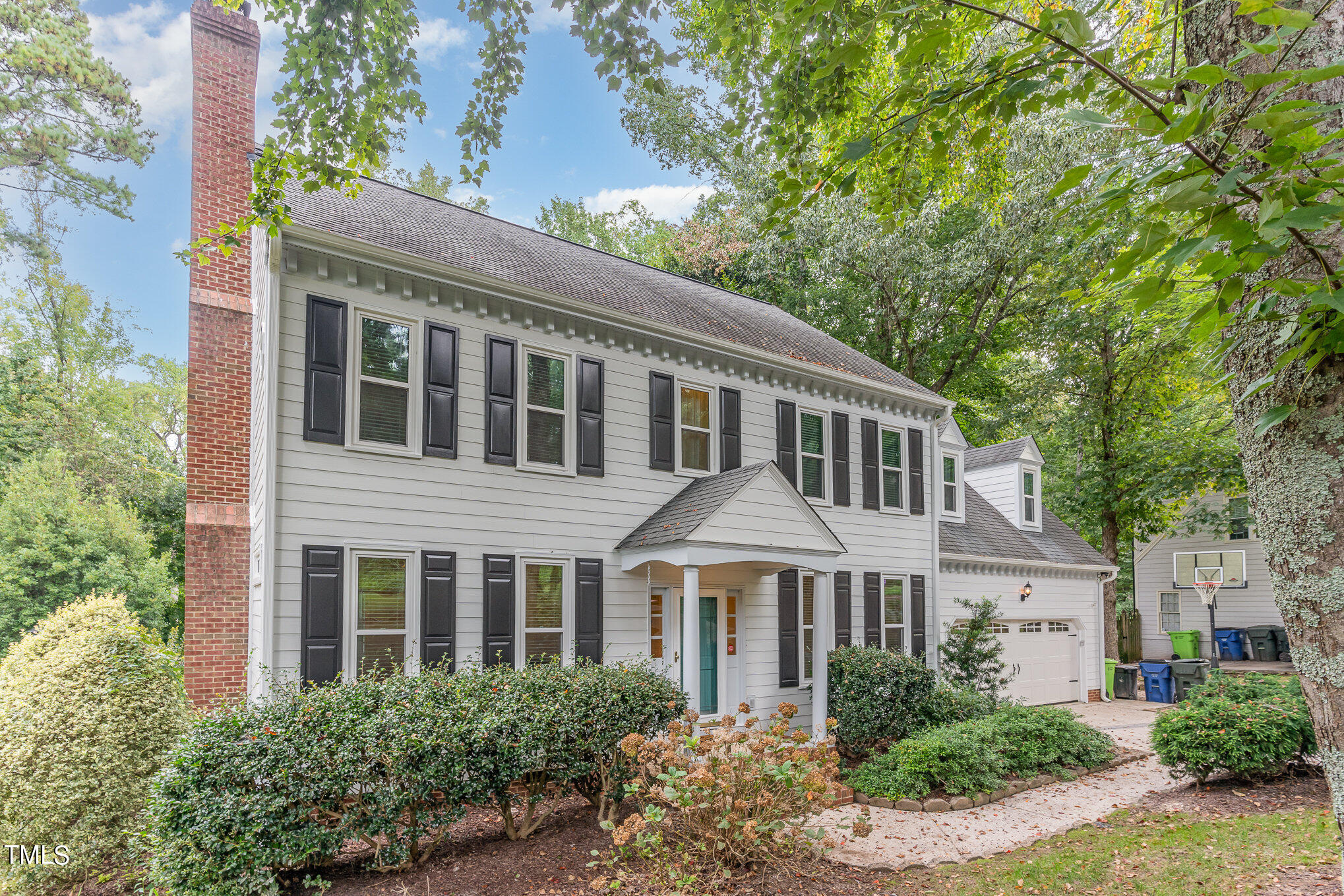 3008 Dunkirk Drive Raleigh, NC 27613 - Photo 30 of 33 a front view of a house with a garden