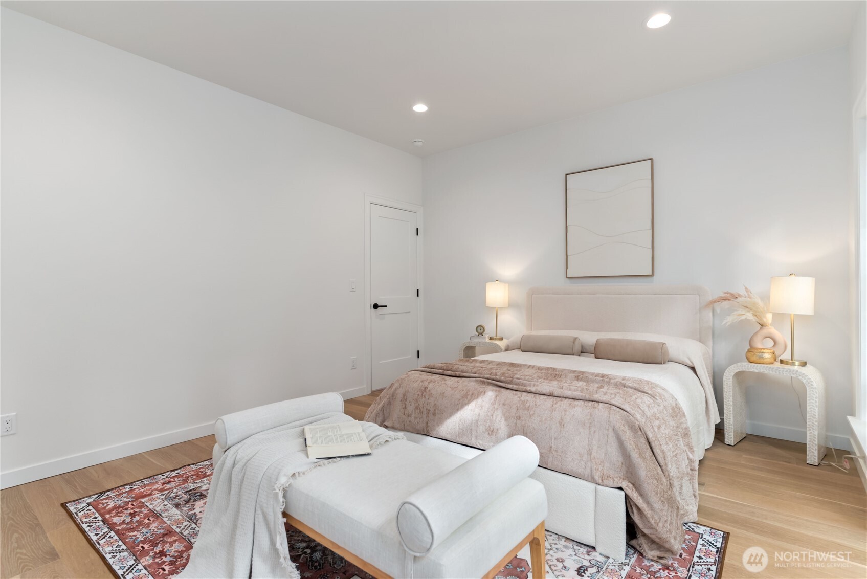 31 East Rhododendron Court Union, WA 98592 - Photo 19 of 38 a bedroom with a bed and a painting on the wall