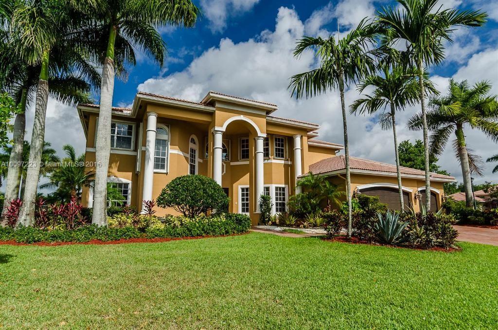 2633 Birch Terrace Davie, FL 33330 - Photo 1 of 35 front view of a house with a garden