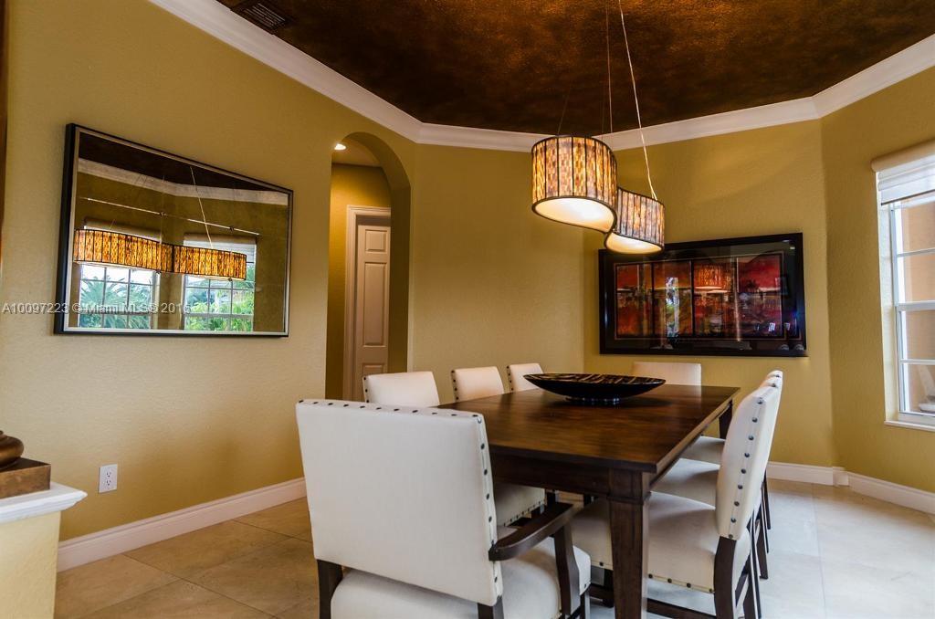 2633 Birch Terrace Davie, FL 33330 - Photo 13 of 35 a dining room with a table and chairs
