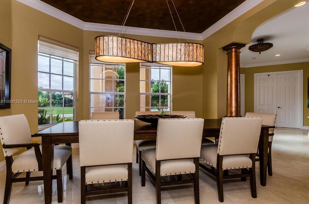 2633 Birch Terrace Davie, FL 33330 - Photo 14 of 35 a view of a dining room with furniture window and outside view