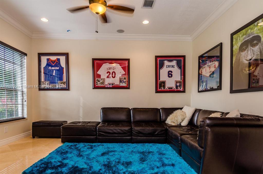 2633 Birch Terrace Davie, FL 33330 - Photo 16 of 35 a living room with furniture and a couch