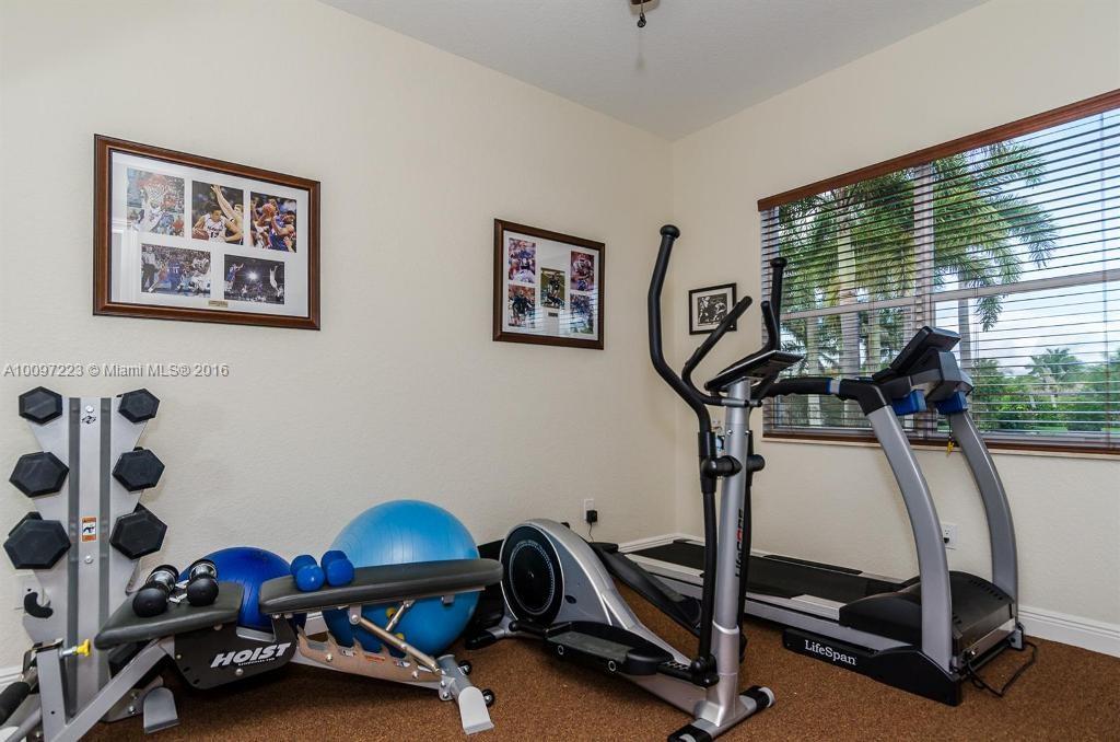2633 Birch Terrace Davie, FL 33330 - Photo 18 of 35 a view of a room with gym equipment