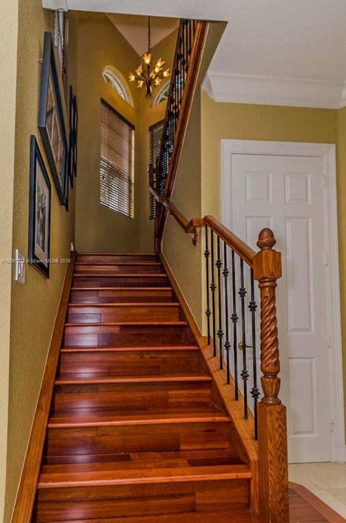 2633 Birch Terrace Davie, FL 33330 - Photo 19 of 35 a view of entryway and hall with wooden floor