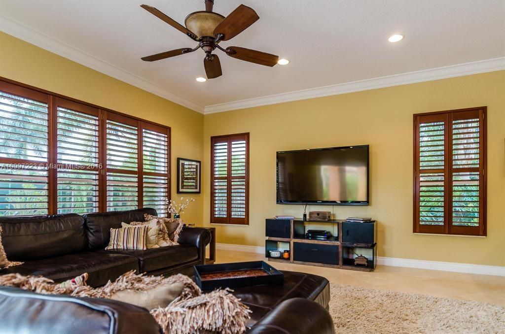 2633 Birch Terrace Davie, FL 33330 - Photo 4 of 35 a living room with furniture and a flat screen tv