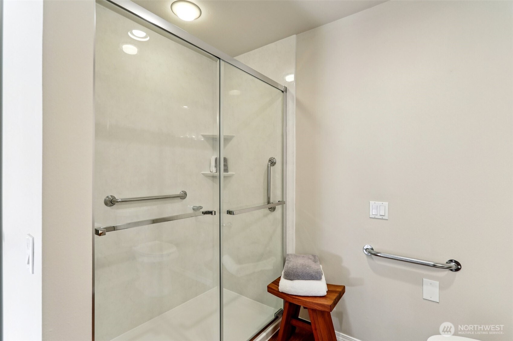 4222 221st Place Southeast, Unit 1081 Issaquah, WA 98029 - Photo 20 of 40 a bathroom with a shower and a toilet