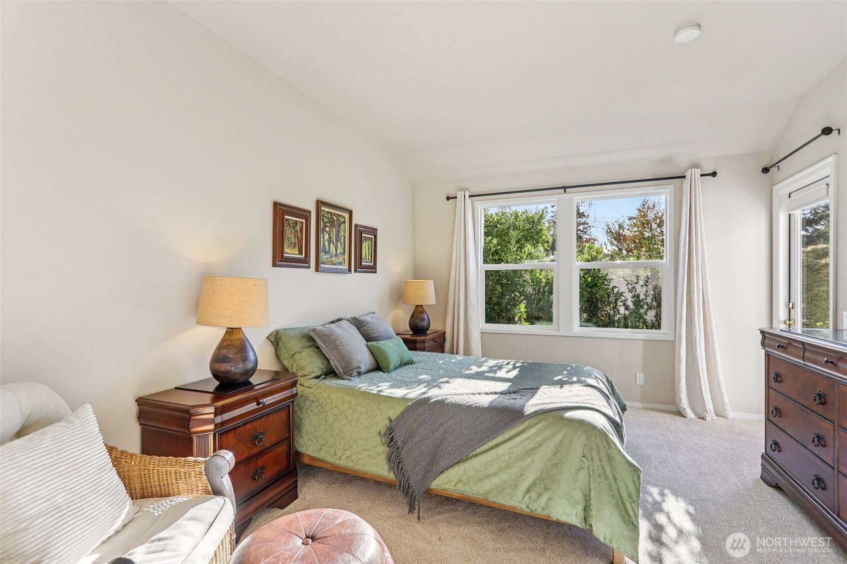 4222 221st Place Southeast, Unit 1081 Issaquah, WA 98029 - Photo 22 of 40 a bedroom with a bed and wooden floor