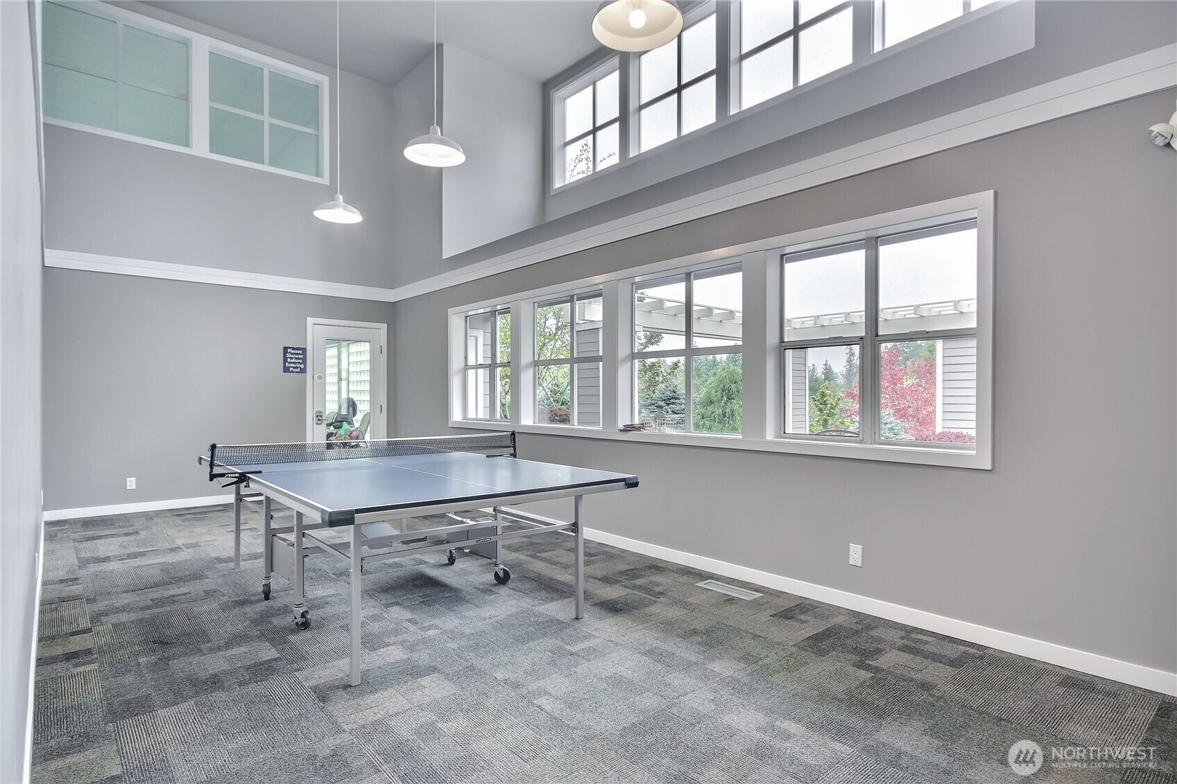 4222 221st Place Southeast, Unit 1081 Issaquah, WA 98029 - Photo 34 of 40 a room with table and windows