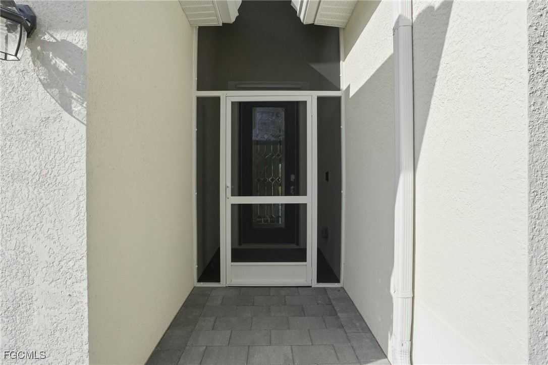 2251 Dancy Street Naples, FL 34120 - Photo 2 of 28 a view of an entryway of a house