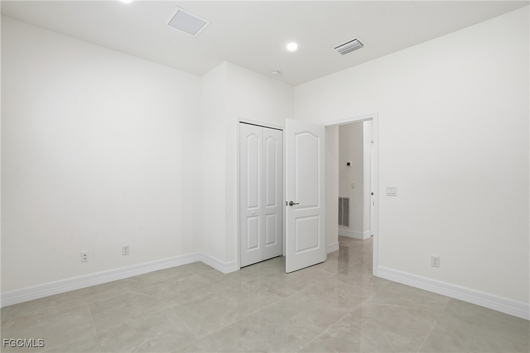 2251 Dancy Street Naples, FL 34120 - Photo 22 of 28 a view of an empty room