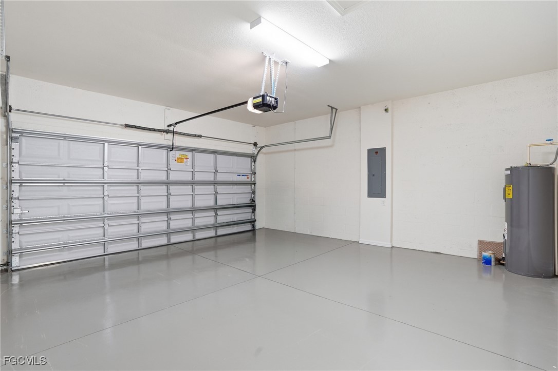 2251 Dancy Street Naples, FL 34120 - Photo 25 of 28 a view of a garage