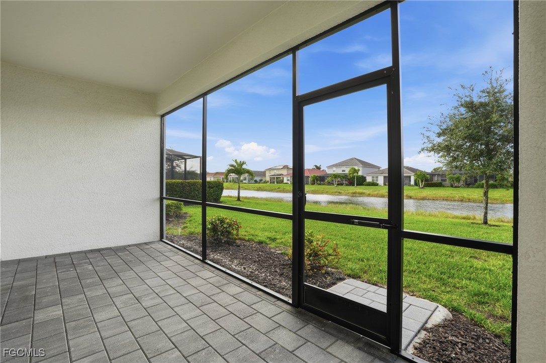 2251 Dancy Street Naples, FL 34120 - Photo 27 of 28 a view of a yard from balcony