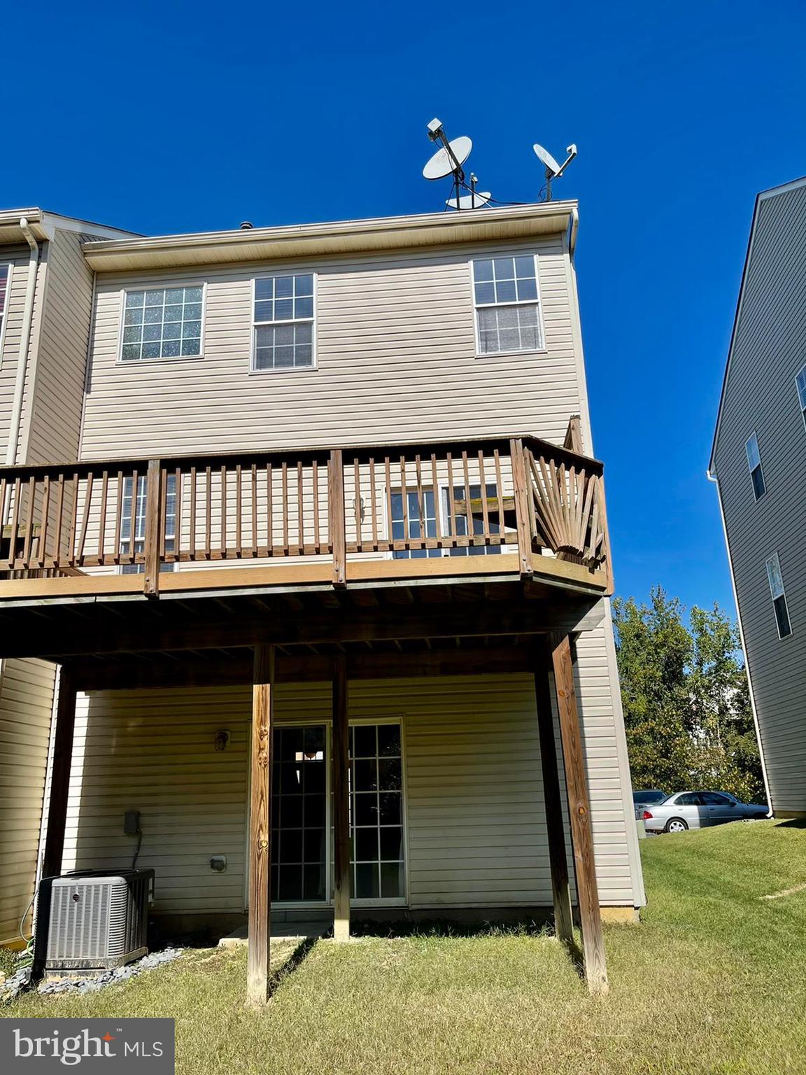 1047 Lily Way Odenton, MD 21113 - Photo 4 of 15 a front view of a house with a yard