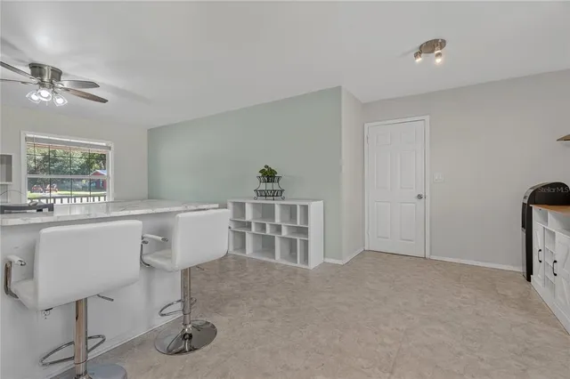 a workspace with furniture and window